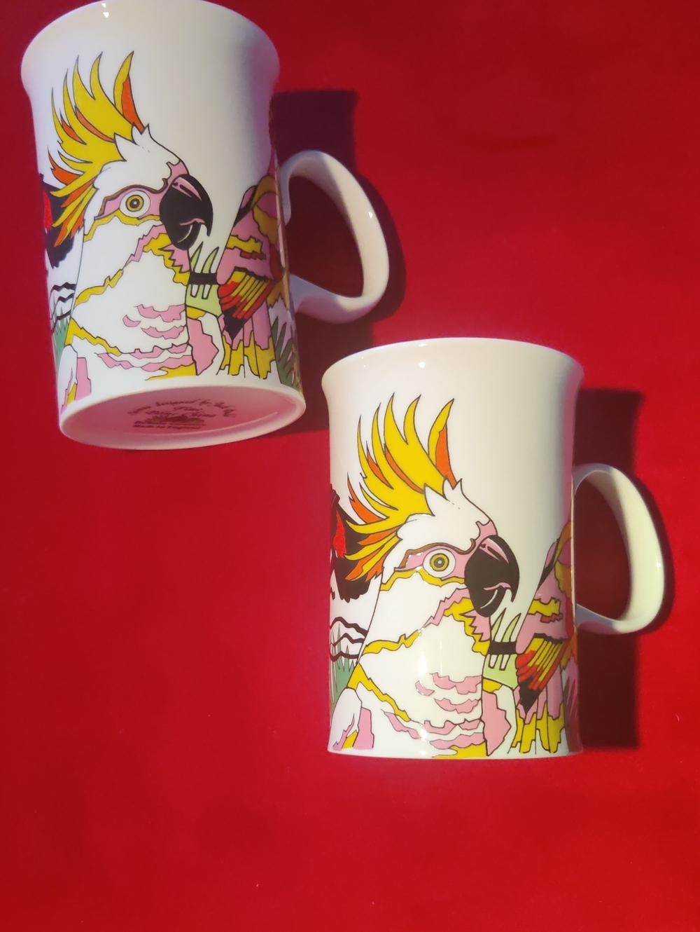 White Ceramic Parrot Accent Mug with Yellow and Pink Illustration